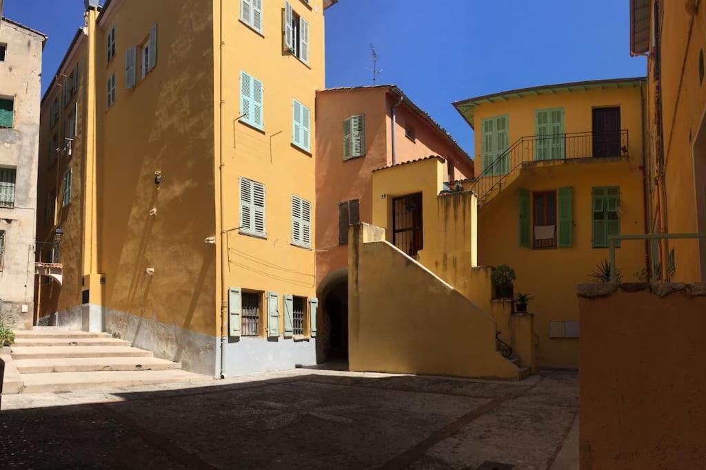 Between The Roofs Of Menton Old Town And The Sea Екстериор снимка