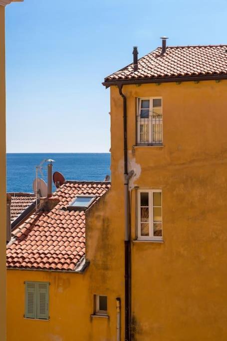 Between The Roofs Of Menton Old Town And The Sea Екстериор снимка